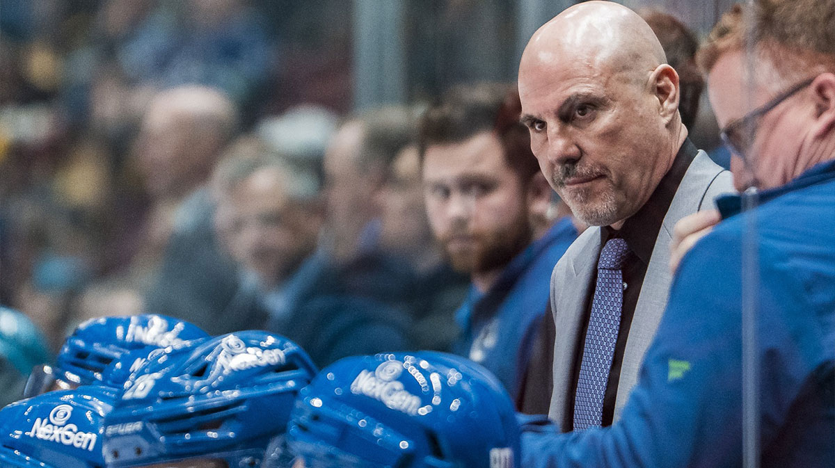 Vancouver Canucks head coach Rick Tocchet on the bench against the San Jose Sharks in the third period at Rogers Arena.