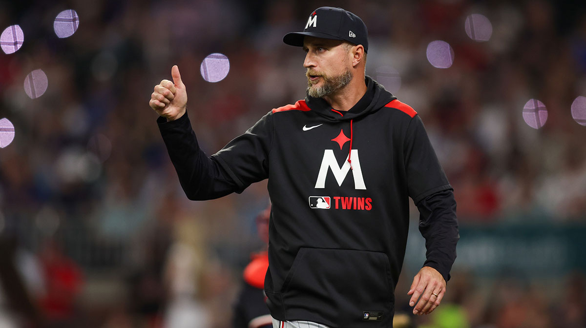 Minnesota Twins manager Rocco Baldelli (5) makes a pitching change against the Atlanta Braves in the sixth inning at Truist Park.