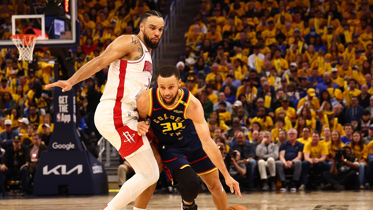 Warriors guard Stephen Curry (30) drives in against Houston Rockets forward/guard Dillon Brooks (9) during the third quarter of game four of the 2025 NBA Playoffs first round at Chase Center