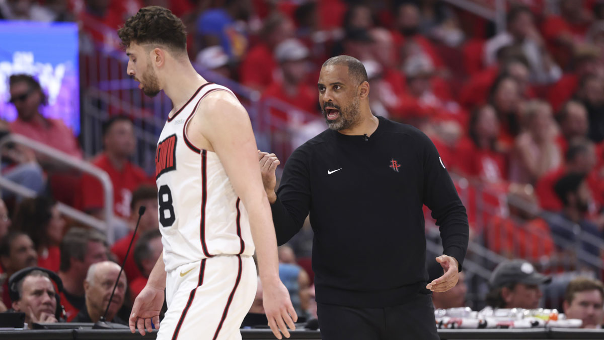 Rockets head coach Ime Udoka talks with center Alperen Sengun (28) after a play during game seven of first round for the 2025 NBA Playoffs against the Golden State Warriors at Toyota Center