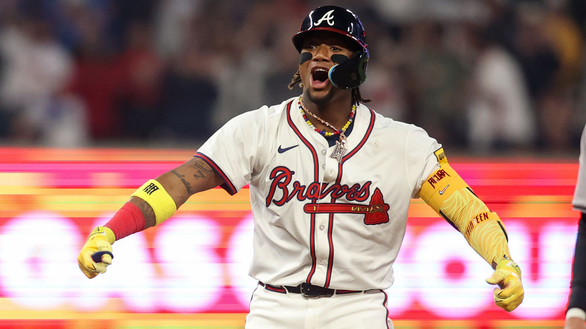 Apr 6, 2024; Atlanta, Georgia, USA; Atlanta Braves right fielder Ronald Acuna Jr. (13) celebrates after a RBI single against the Arizona Diamondbacks in the eighth inning at Truist Park. Mandatory Credit: Brett Davis-Imagn Images