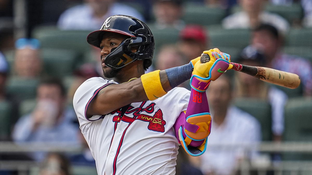 Atlanta Braves right fielder Ronald Acuna Jr (13) hits a double against the San Diego Padres during the fifth inning at Truist Park.