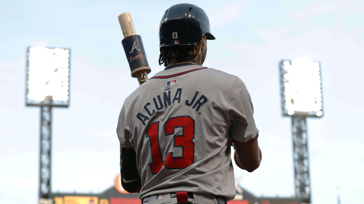 May 24, 2024; Pittsburgh, Pennsylvania, USA; Atlanta Braves right fielder Ronald Acuna Jr. (13) in the on-deck circle against the Pittsburgh Pirates during the fifth inning at PNC Park. Mandatory Credit: Charles LeClaire-Imagn Images