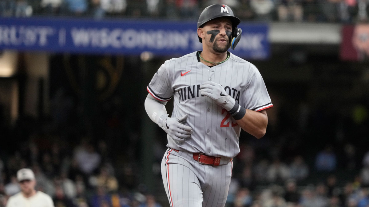 Minnesota Twins third base Royce Lewis (23) rounds the bases after hitting a home run against the Milwaukee Brewers in the fourth inning at American Family Field.