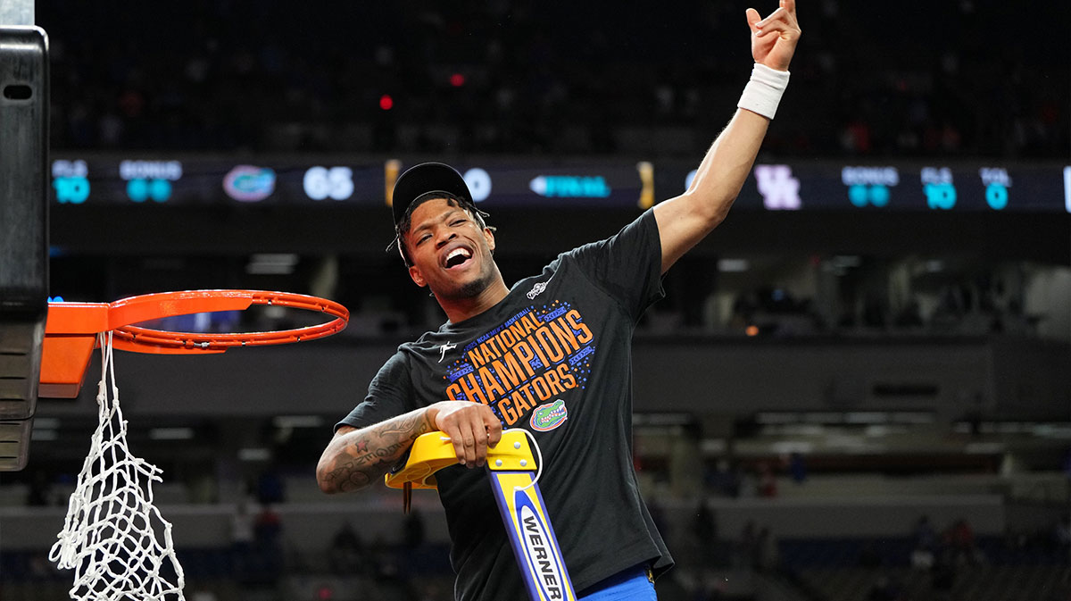 Florida Gators center Rueben Chinyelu (9) reacts after cutting down a piece of the net after winning the national championship game of the Final Four of the 2025 NCAA Tournament at the Alamodome.