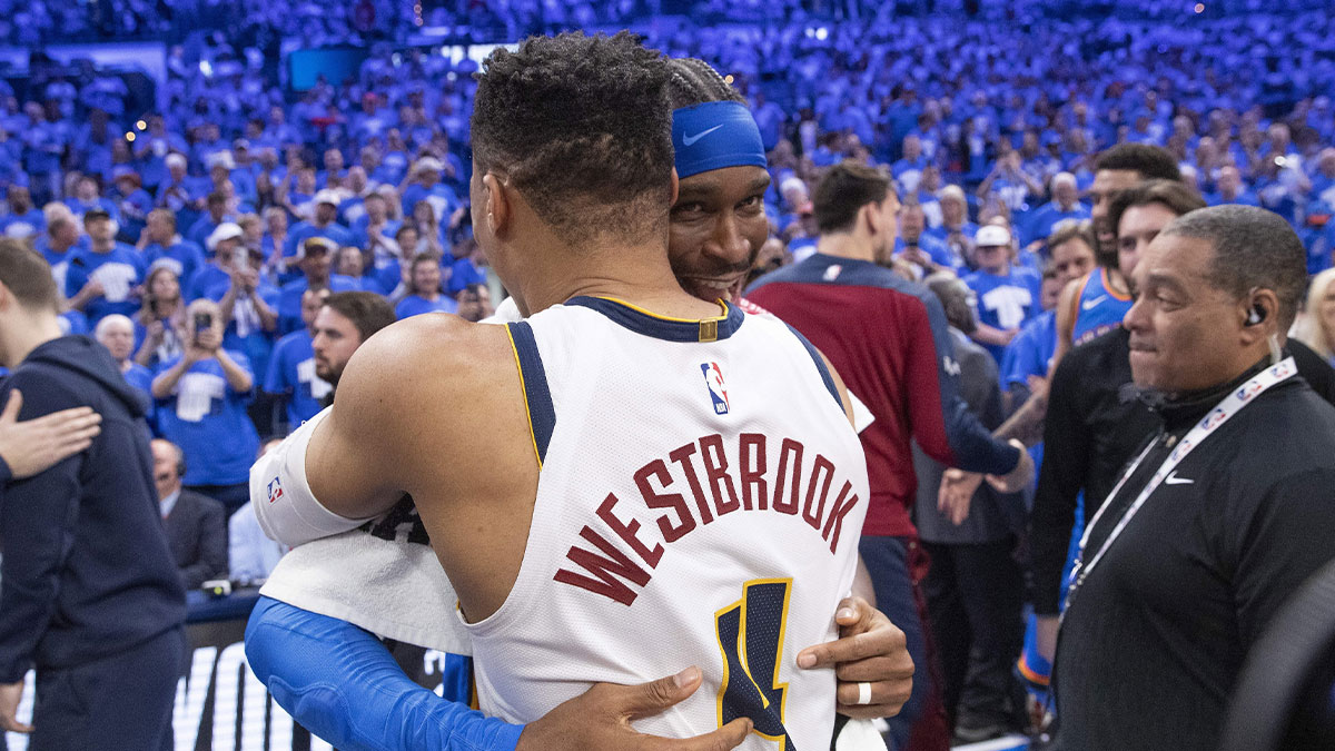 Oklahoma City Thunder guard Shai Gilgeous-Alexander (2) and Denver Nuggets guard Russell Westbrook (4) hug after their game seven of the second round for the 2025 NBA Playoffs at Paycom Center.