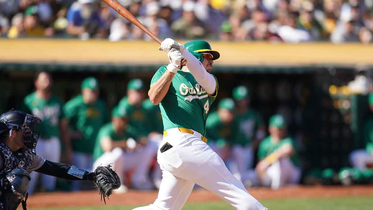 Oakland Athletics infielder Ryan Noda hits a two-run double against the New York Yankees in the sixth inning at the Oakland-Alameda County Coliseum.