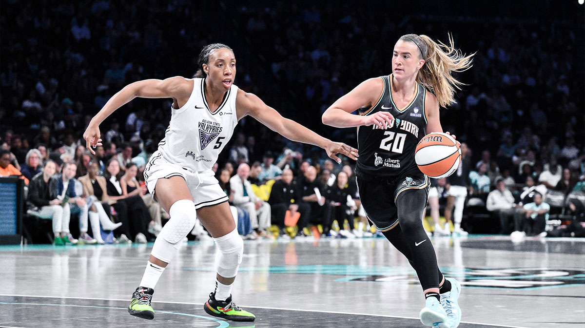 New York Liberty guard Sabrina Ionescu (20) drives to the basket while being defended by Golden State Valkyries forward Kayla Thornton (5) during the second half at Barclays Center.