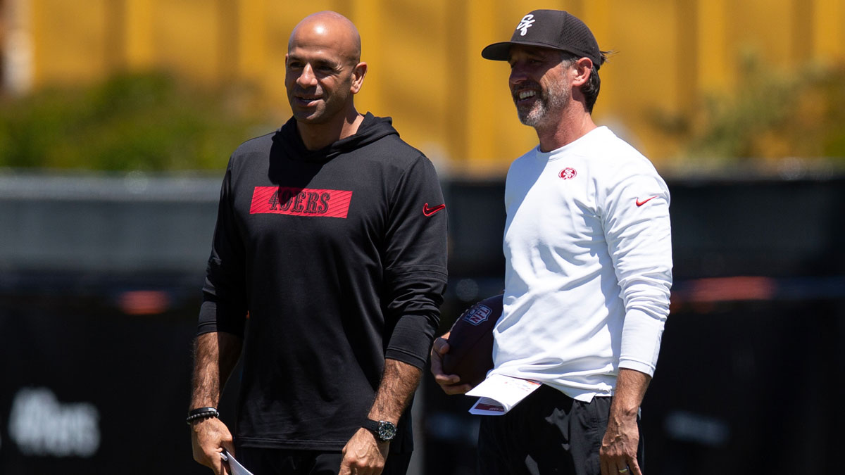 May 9, 2025; Santa Clara, CA, USA; San Francisco 49ers head coach Kyle Shanahan, right, confers with defensive coordinator Robert Saleh during the teamís rookie minicamp. Mandatory Credit: D. Ross Cameron-Imagn Images. As the 49ers need to focus on a Freed Warner contract.