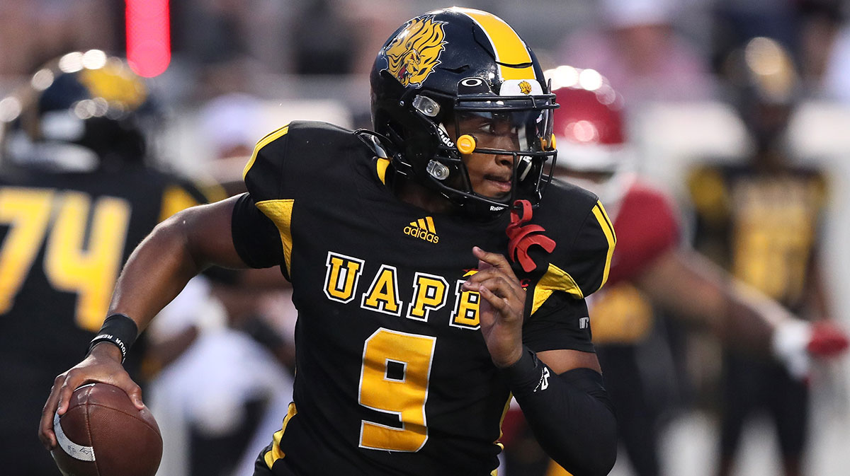 Pine Bluff Golden Lions quarterback Mekhi Hagens (9) rushes in