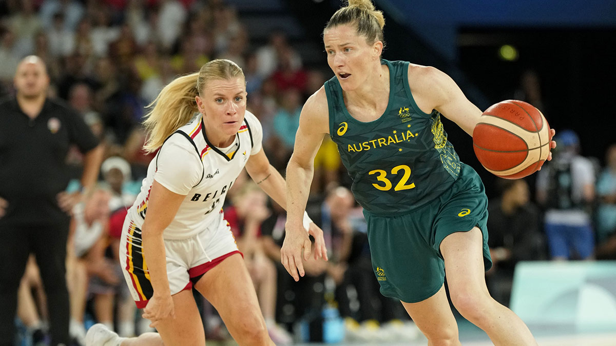 Australia guard Sami Whitcomb (32) drives to the basket against Belgium point guard Julie Vanloo (35) in the women's basketball bronze medal game during the Paris 2024 Olympic Summer Games at Accor Arena.