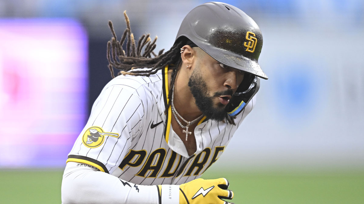 May 27, 2025; San Diego, California, USA; San Diego Padres outfielder Fernando Tatis Jr. (23) rounds the bases after hitting a solo home run during the first inning against the Miami Marlins at Petco Park. Mandatory Credit: Denis Poroy-Imagn Images