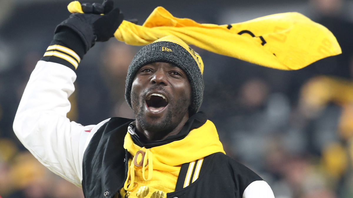 Pennsylvania, USA; Pittsburgh Steelers former wide receiver and Super Bowl XLIII MVP Santonio Holmes leads the Terrible Towel wave before the game