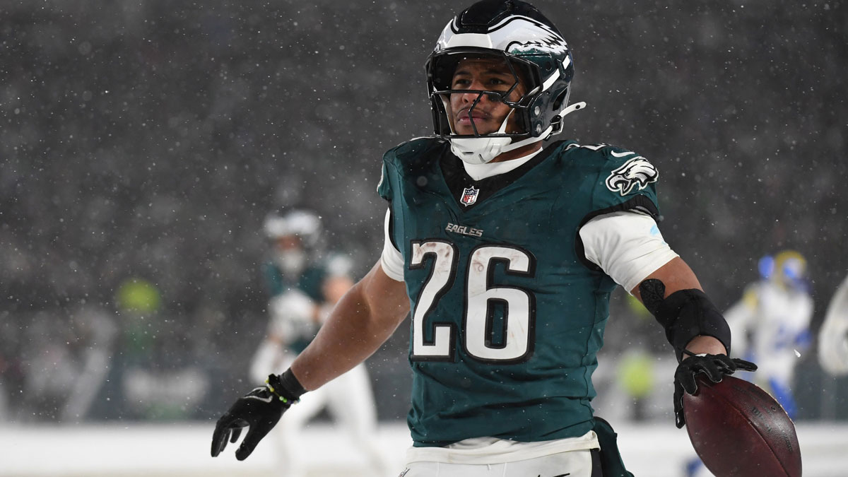 Philadelphia Eagles running back Saquon Barkley (26) celebrates after scoring a touchdown against the Los Angeles Rams in the second half in a 2025 NFC divisional round game at Lincoln Financial Field.