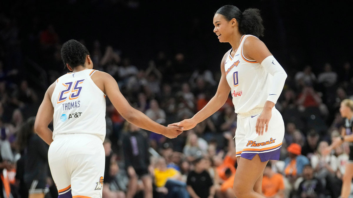 Phoenix Mercury forward sAlyssa Thomas (25) and Satou Sabally (0) slap hands during pre-season action against the Golden State Valkyries at PHX Arena May 11, 2025.