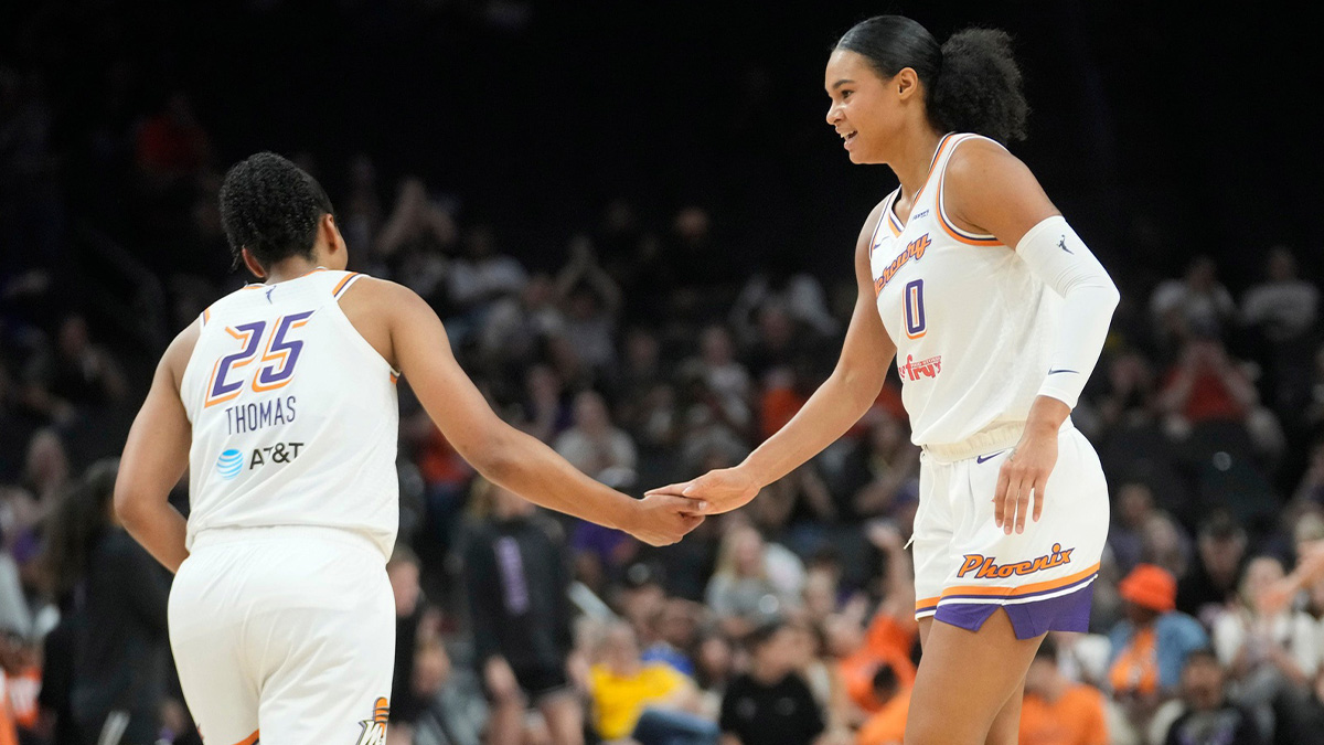 Phoenix Mercury forwards Alyssa Thomas (25) and Satou Sabally (0) slap hands during pre-season action against the Golden State Valkyries at PHX Arena May 11, 2025.