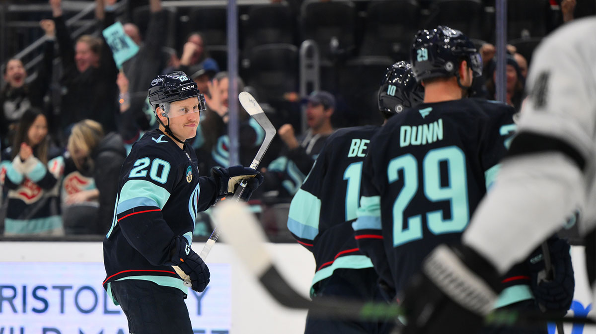 Seattle Kraken right wing Eeli Tolvanen (20) reacts to scoring a goal against the Los Angeles Kings during the third period at Climate Pledge Arena.
