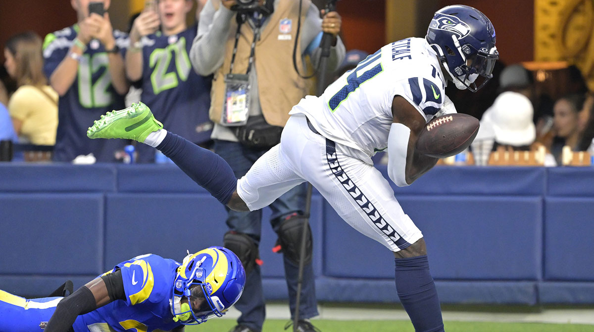 Seattle Seahawks wide receiver DK Metcalf (14) can’t hang on to a pass in the end zone as he is defended by Los Angeles Rams cornerback Emmanuel Forbes Jr. (25) in the first half at SoFi Stadium.