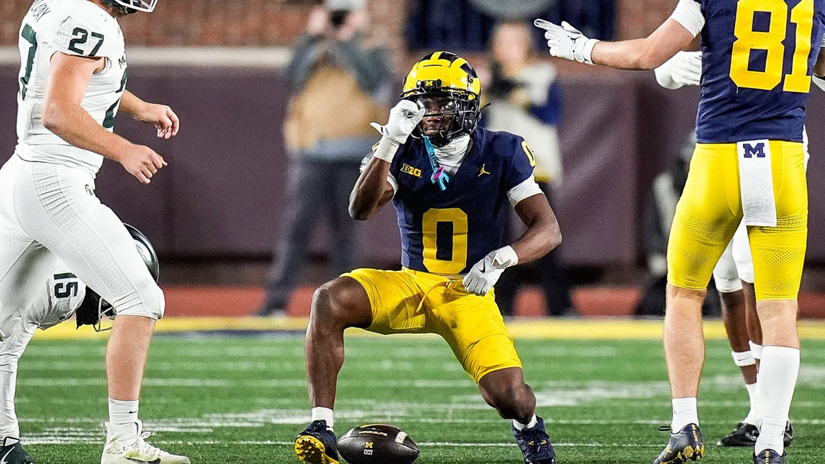 Michigan wide receiver Semaj Morgan (0) celebrates a play against Michigan State during the second half at Michigan Stadium