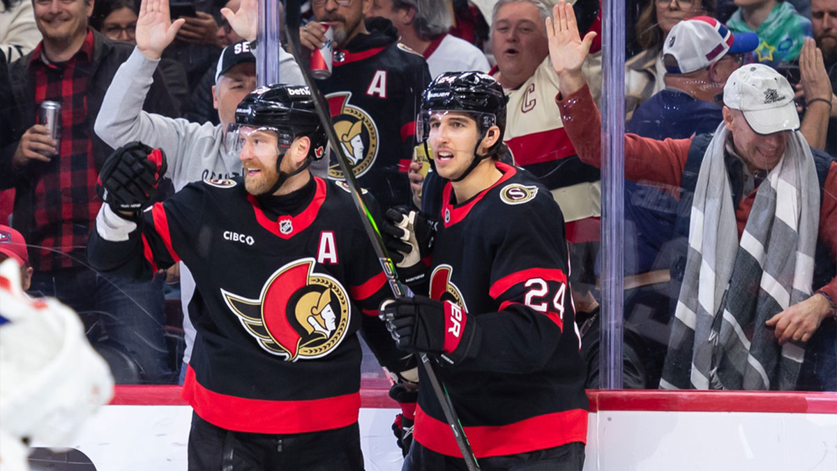 Ottawa Senators right wing Claude Giroux (28) celebrates a goal scored by center Dylan Cozens (24) in the first period against the Montreal Canadiens at the Canadian Tire Centre.
