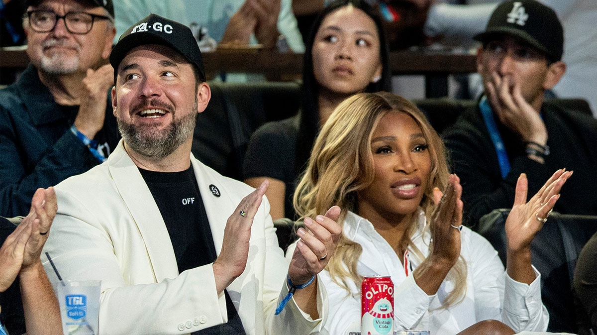 Los Angeles Golf Club owners Alexis Ohanian and Serena Williams cheer for their team against the New York Golf Club during the TGL semifinal match at SoFi Center on March 17, 2025, in Palm Beach Gardens, Florida.