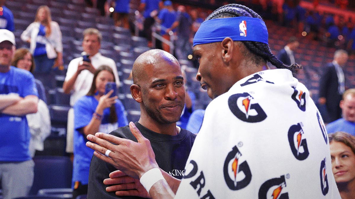 Oklahoma City Thunder guard Shai Gilgeous-Alexander (2) talks to Chris Paul after defeating the Minnesota Timberwolves during game two of the western conference finals for the 2025 NBA Playoffs at Paycom Center.