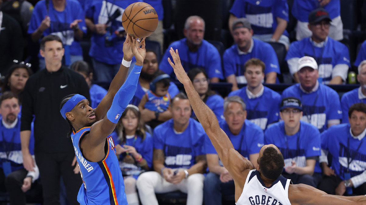 Oklahoma City Thunder guard Shai Gilgeous-Alexander (2) shoots against Minnesota Timberwolves center Rudy Gobert (27) in the fourth quarter during game two of the western conference finals for the 2025 NBA Playoffs at Paycom Center.