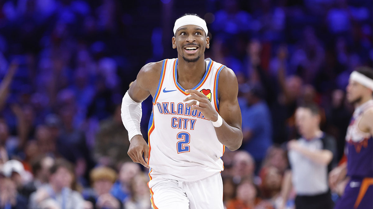 Oklahoma City Thunder guard Shai Gilgeous-Alexander (2) smiles after scoring against the Phoenix Suns during the second half of a game at Paycom Center.