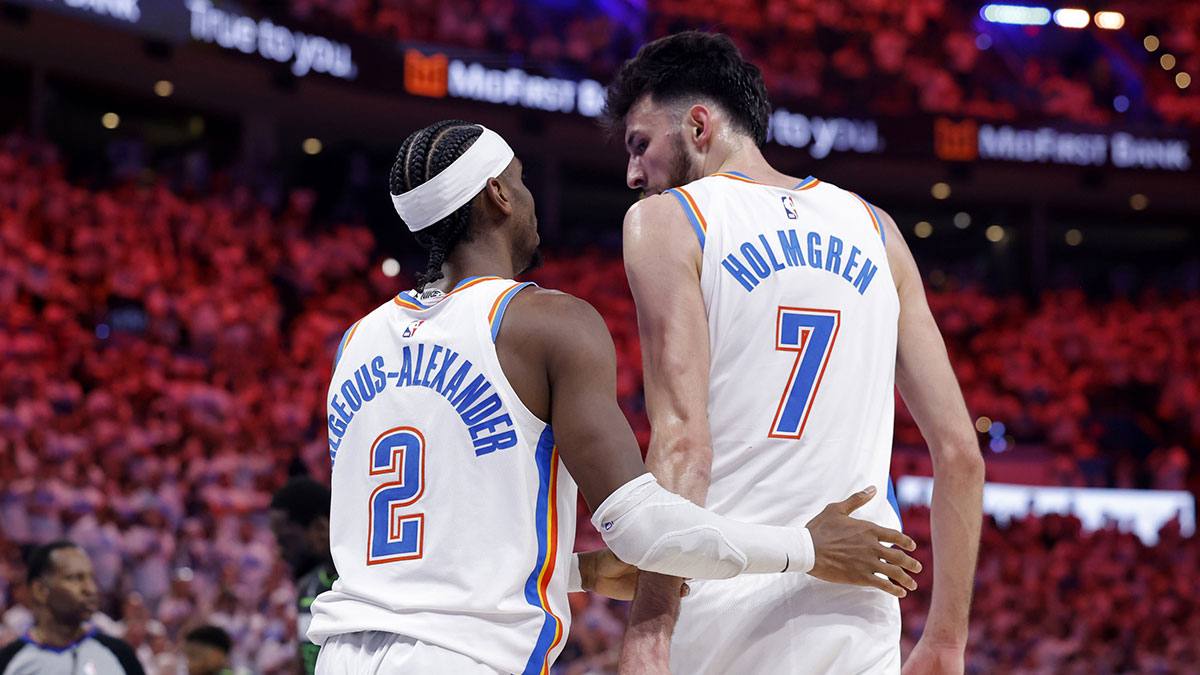 Thunder guard Shai Gilgeous-Alexander (2) and forward Chet Holmgren (7) react after a play in the fourth quarter against the Minnesota Timberwolves during game one of the western conference finals for the 2025 NBA Playoffs at Paycom Center.