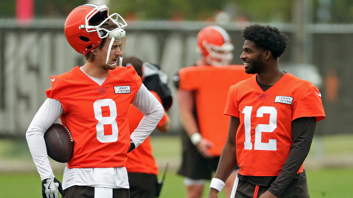 Cleveland Browns quarterback Kenny Pickett, left, chats with quarterback Shedeur Sanders (12) during an NFL practice at the Cleveland Browns training facility on Wednesday, May 28, 2025, in Berea, Ohio.
