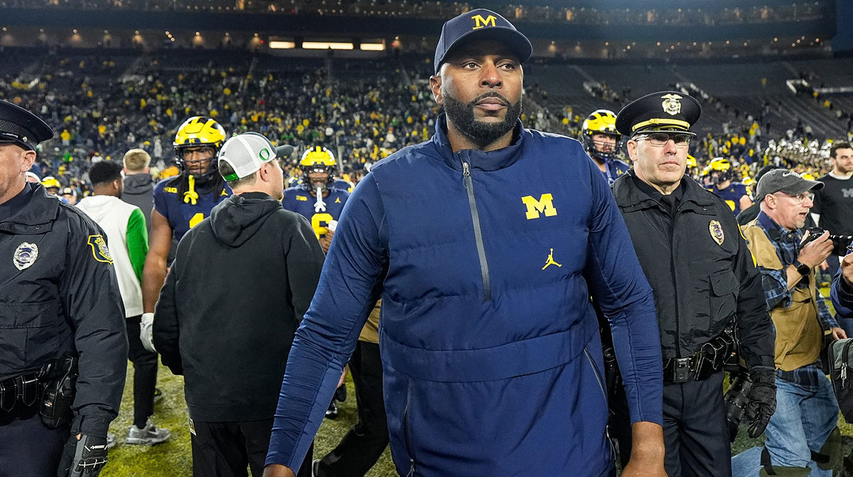 Michigan head coach Sherrone Moore walks off the field after 38-17 loss to Oregon at Michigan Stadium in Ann Arbor on Saturday, Nov. 2, 2024.