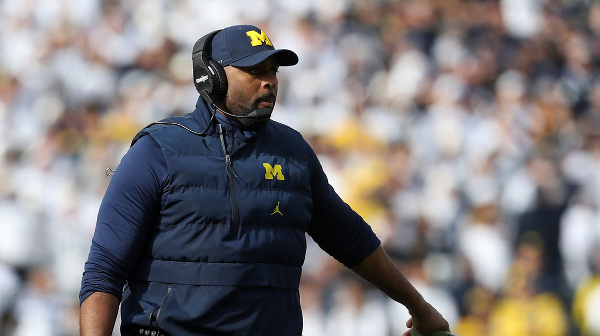Michigan Wolverines Michigan Wolverines offensive lines coach Sherrone Moore gestures from the sideline during the first quarter against the Penn State Nittany Lions at Beaver Stadium.