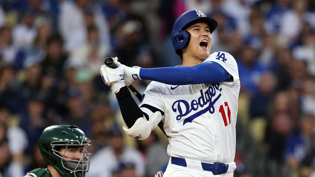 Los Angeles Dodgers two-way player Shohei Ohtani (17) reacts after a ground out against the Athletics during the second inning at Dodger Stadium.
