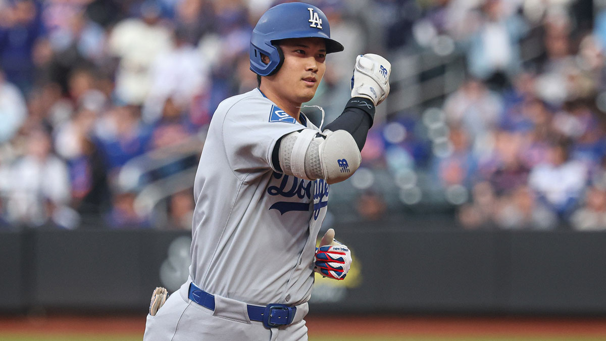 Los Angeles Dodgers designated hitter Shohei Ohtani (17) rounds the bases after a solo home run during the first inning against the New York Mets at Citi Field. 