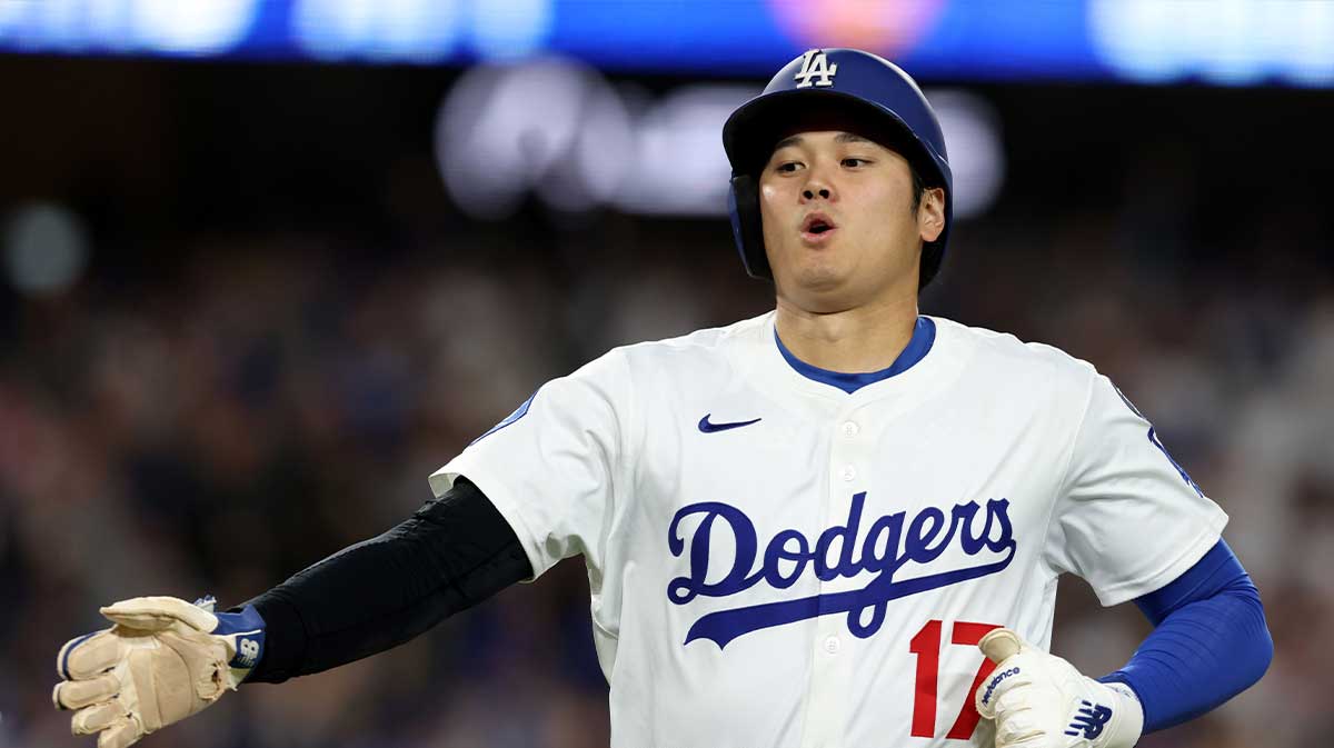 Los Angeles Dodgers designated hitter Shohei Ohtani (17) scores during the eighth inning against the Athletics at Dodger Stadium.