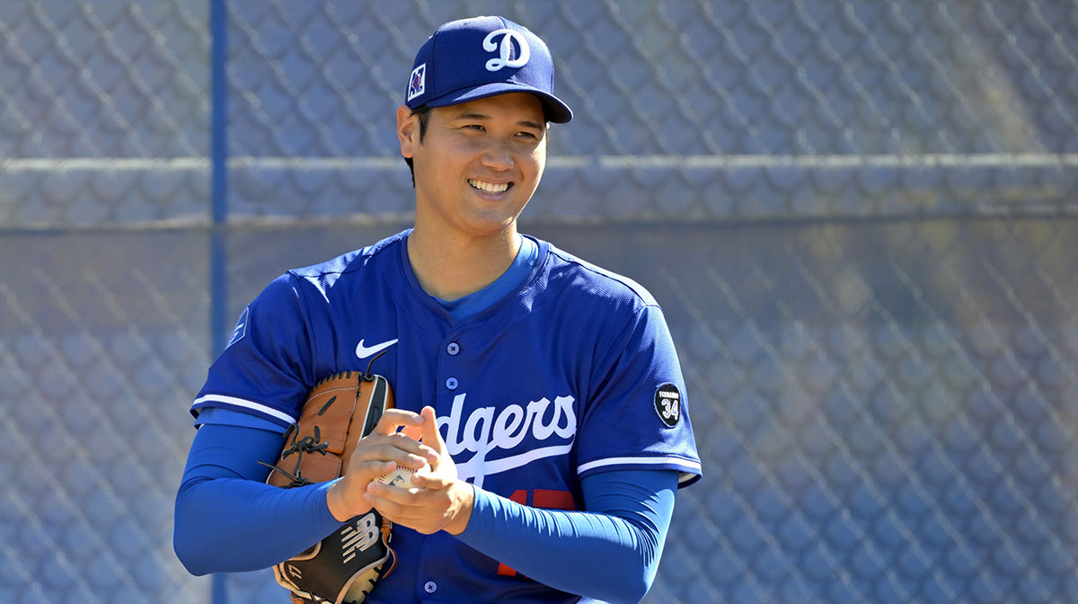 Los Angeles Dodgers designated hitter Shohei Ohtani (17) throws a bullpen session during spring training workouts at Camelback Ranch.