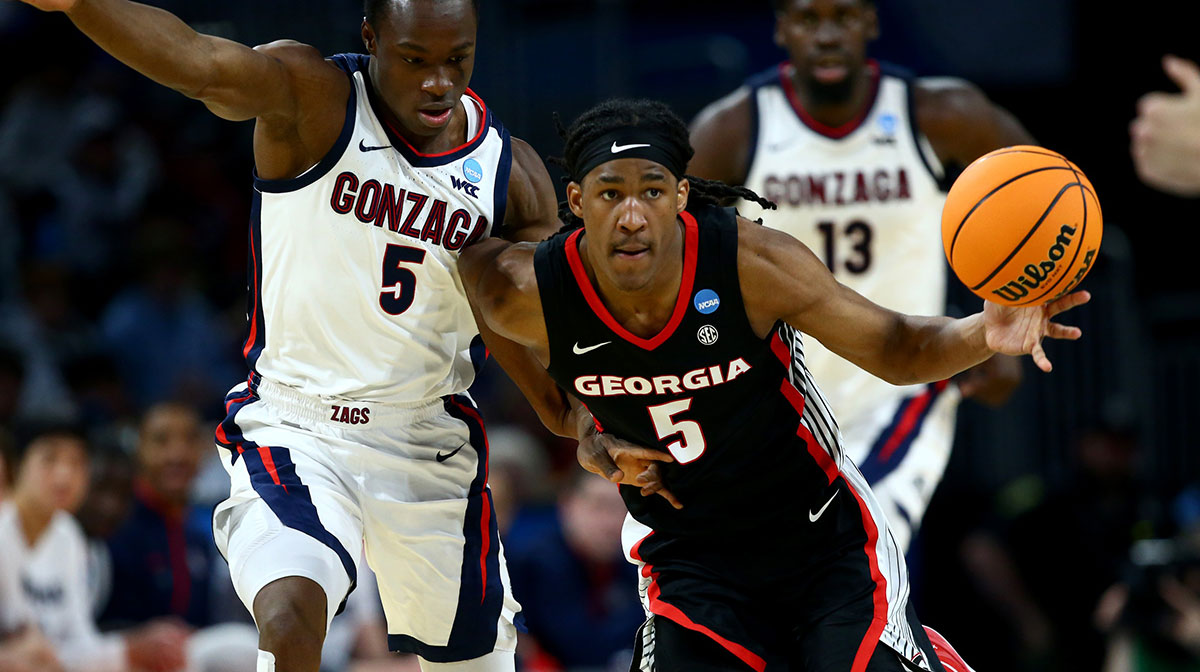 Georgia Bulldogs guard Silas Demary Jr. (5) dribbles against Gonzaga Bulldogs forward Emmanuel Innocenti (5) in the second half of a first round men’s NCAA Tournament game at Intrust Bank Arena.