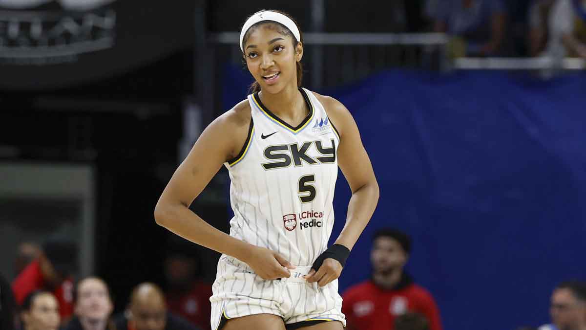 Chicago Sky forward Angel Reese (5) smiles during the second half of a WNBA pre-season game against the Minnesota Lynx at Wintrust Arena.