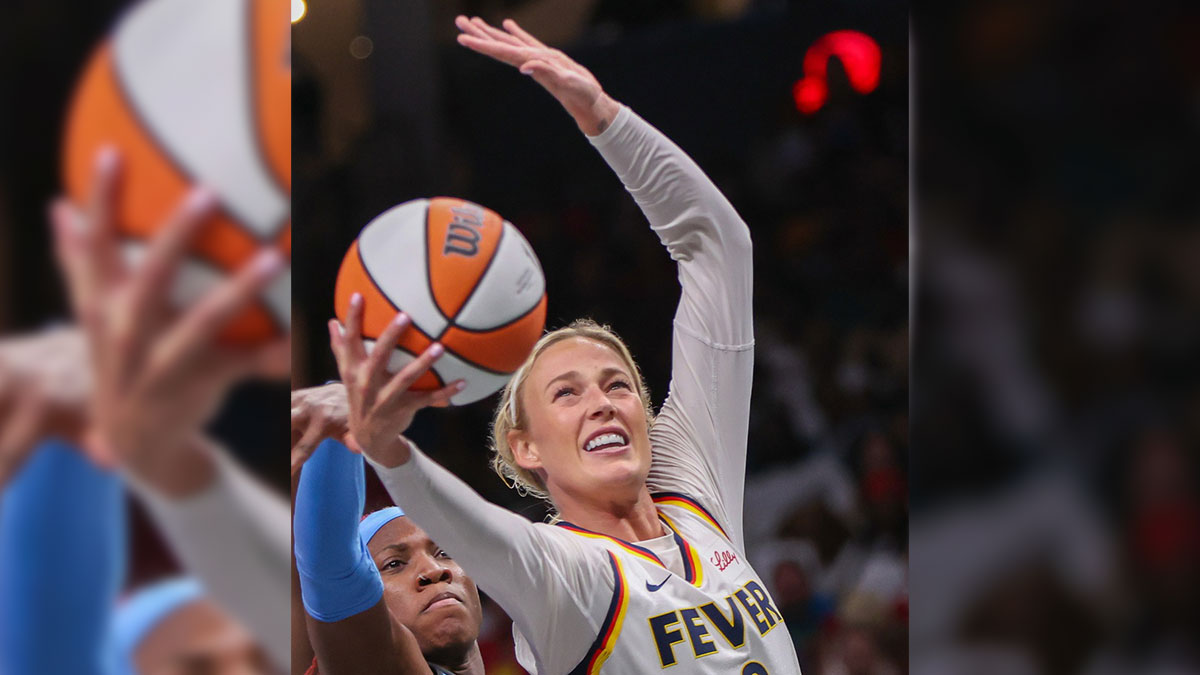 May 22, 2025; Atlanta, Georgia, USA; Indiana Fever guard Sophie Cunningham (8) shoots against the Atlanta Dream in the third quarter at State Farm Arena. Mandatory Credit: Brett Davis-Imagn Images