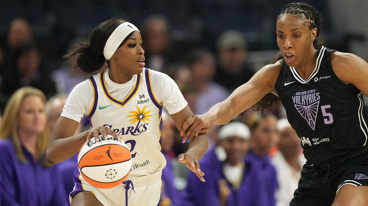 Los Angeles Sparks forward Rickea Jackson (left) dribbles against Golden State Valkyries forward Kayla Thornton (5) during the third quarter at Chase Center.