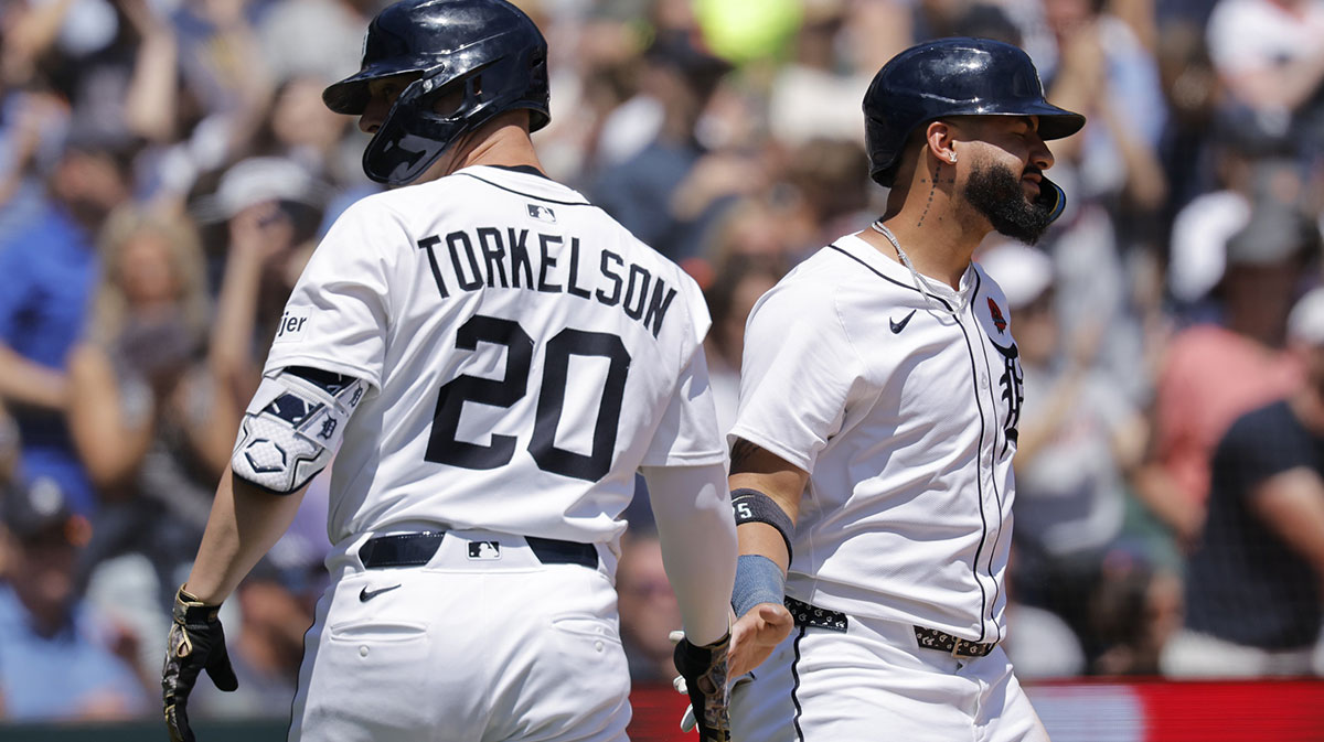 Detroit Tigers second base Gleyber Torres (25) receives congratulations from first base Spencer Torkelson (20) after scoring in the fifth inning against the San Francisco Giants at Comerica Park.
