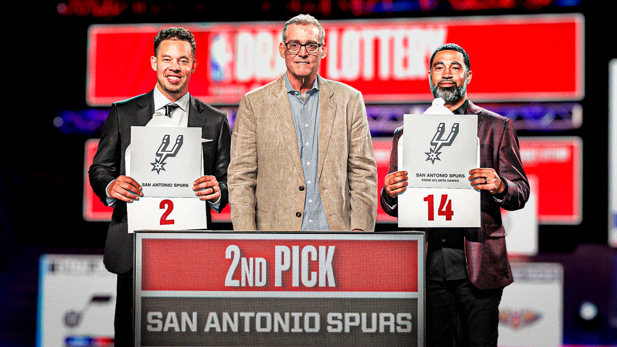 San Antonio Spurs executives show the NBA Draft picks they won in the NBA Draft lottery.