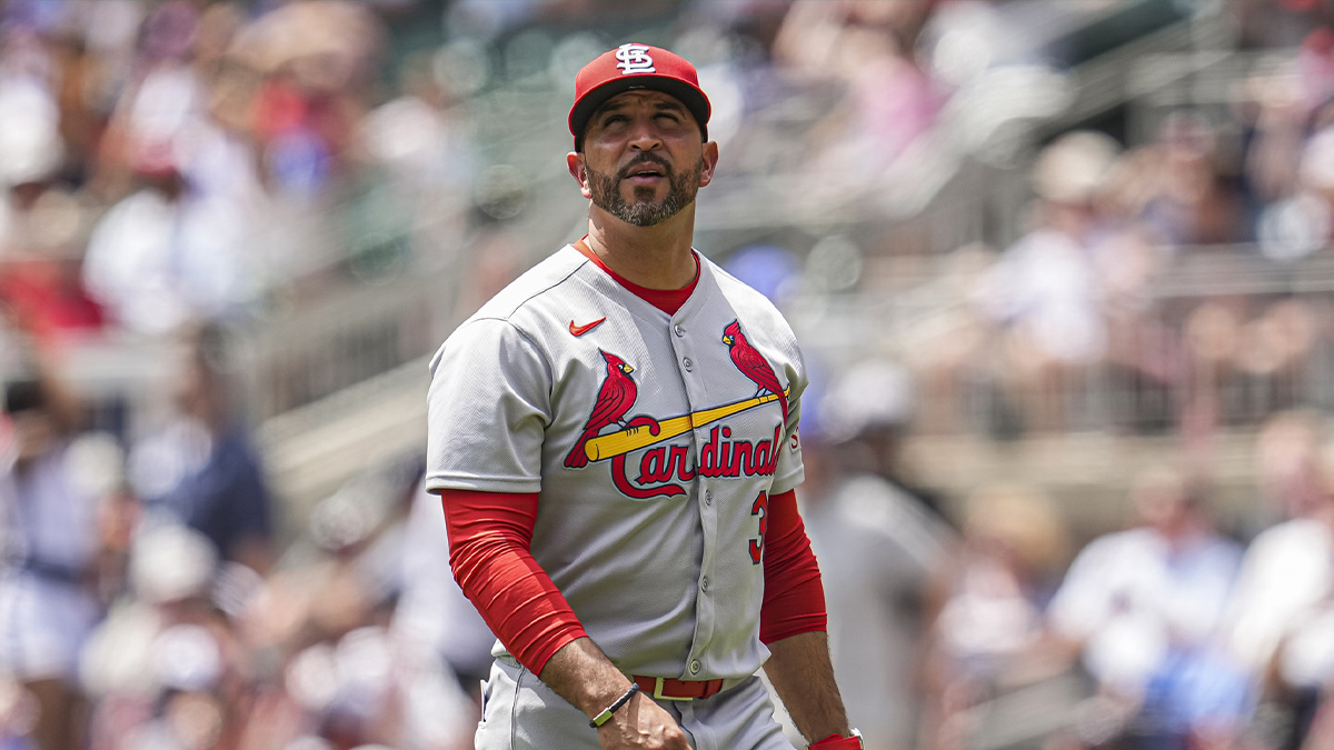 St. Louis Cardinals manager Oliver Marmol (37) on the field to change pitchers against the Atlanta Braves during the seventh inning at Truist Park.