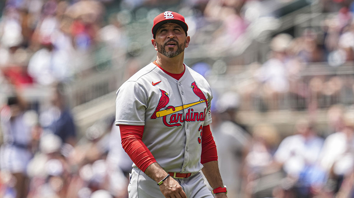 St. Louis Cardinals manager Oliver Marmol (37) on the field to change pitchers against the Atlanta Braves during the seventh inning at Truist Park.