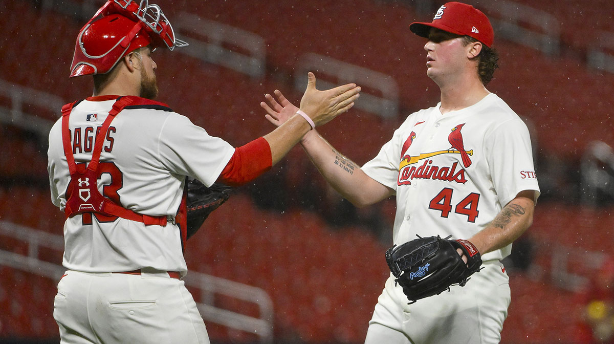 St. Louis Cardinals relief pitcher Gordon Graceffo (44) and catcher Pedro Pages (43) celebrate after the Cardinals defeated the Detroit Tigers at Busch Stadium.
