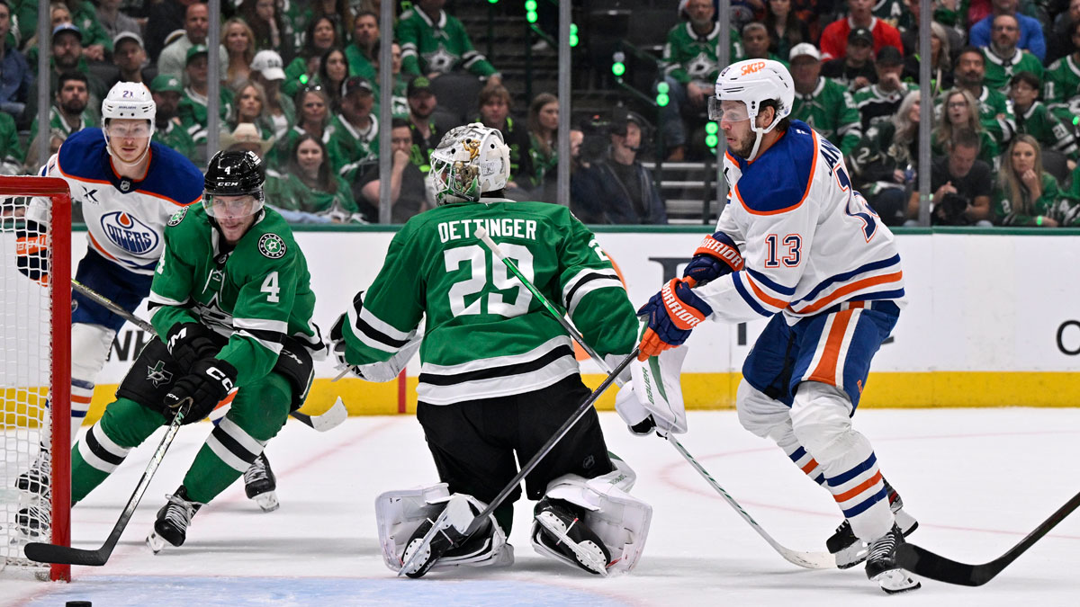 Edmonton Oilers center Mattias Janmark (13) shoots the puck on Dallas Stars goaltender Jake Oettinger (29) in the third period for game two of the Western Conference Final of the 2025 Stanley Cup Playoffs at American Airlines Center.