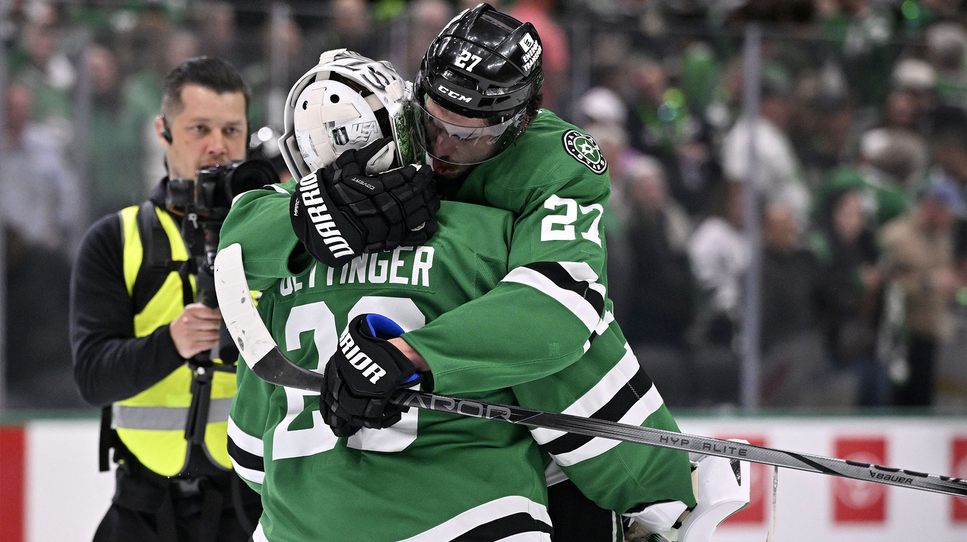 Dallas Stars goaltender Jake Oettinger (29) reacts with left wing Mason Marchment (27) after defeating the Edmonton Oilers in game one of the Western Conference Final of the 2025 Stanley Cup Playoffs at American Airlines Center.