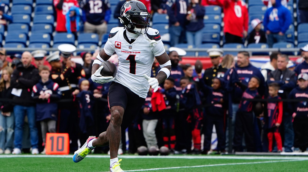 Houston Texans wide receiver Stefon Diggs (1) warms up prior to the game against the New England Patriots at Gillette Stadium. Gregory Fisher-Imagn Images