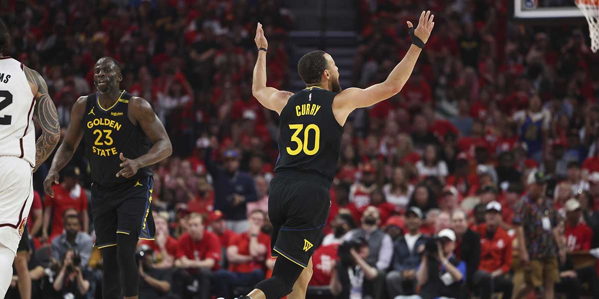 Golden State Warriors guard Stephen Curry (30) reacts after making a basket during the first quarter of game seven of the first round for the 2025 NBA Playoffs against the Houston Rockets at Toyota Center.