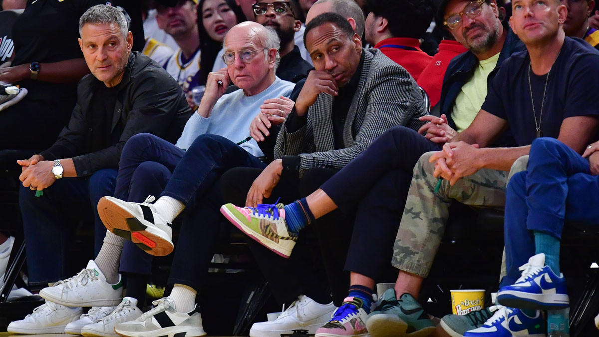 Comedian Larry David and sports media personality Stephen A. Smith attend the game between the Los Angeles Lakers and New York Knicks during the first half at Crypto.com Arena.